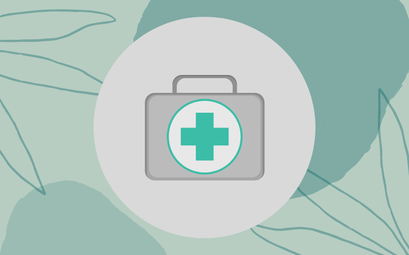 Medic bag on green, leafy background