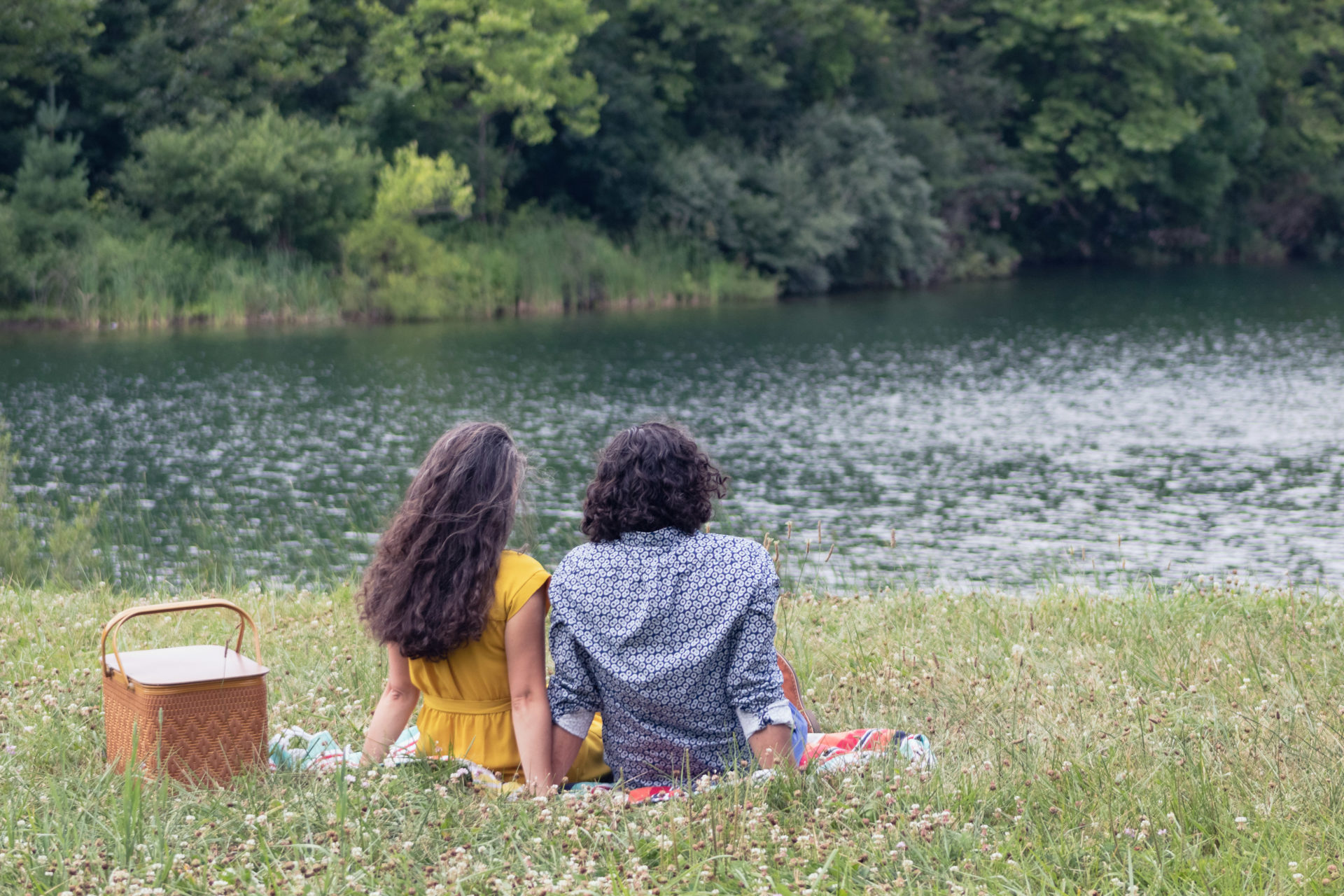 Couple enjoying a picnic by the pond. Photo by Conservancy Staff