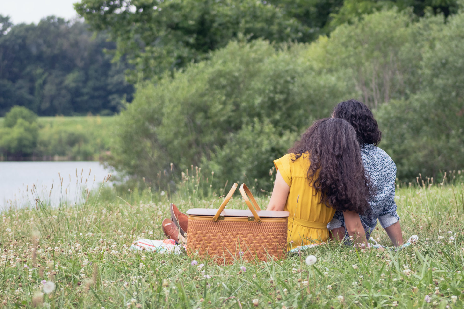 Couple enjoying a picnic by the pond. Photo by Conservancy Staff