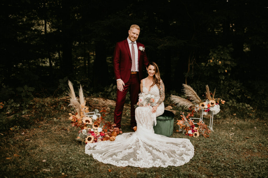 Man and woman pose for a photo outside after their pop-up park wedding