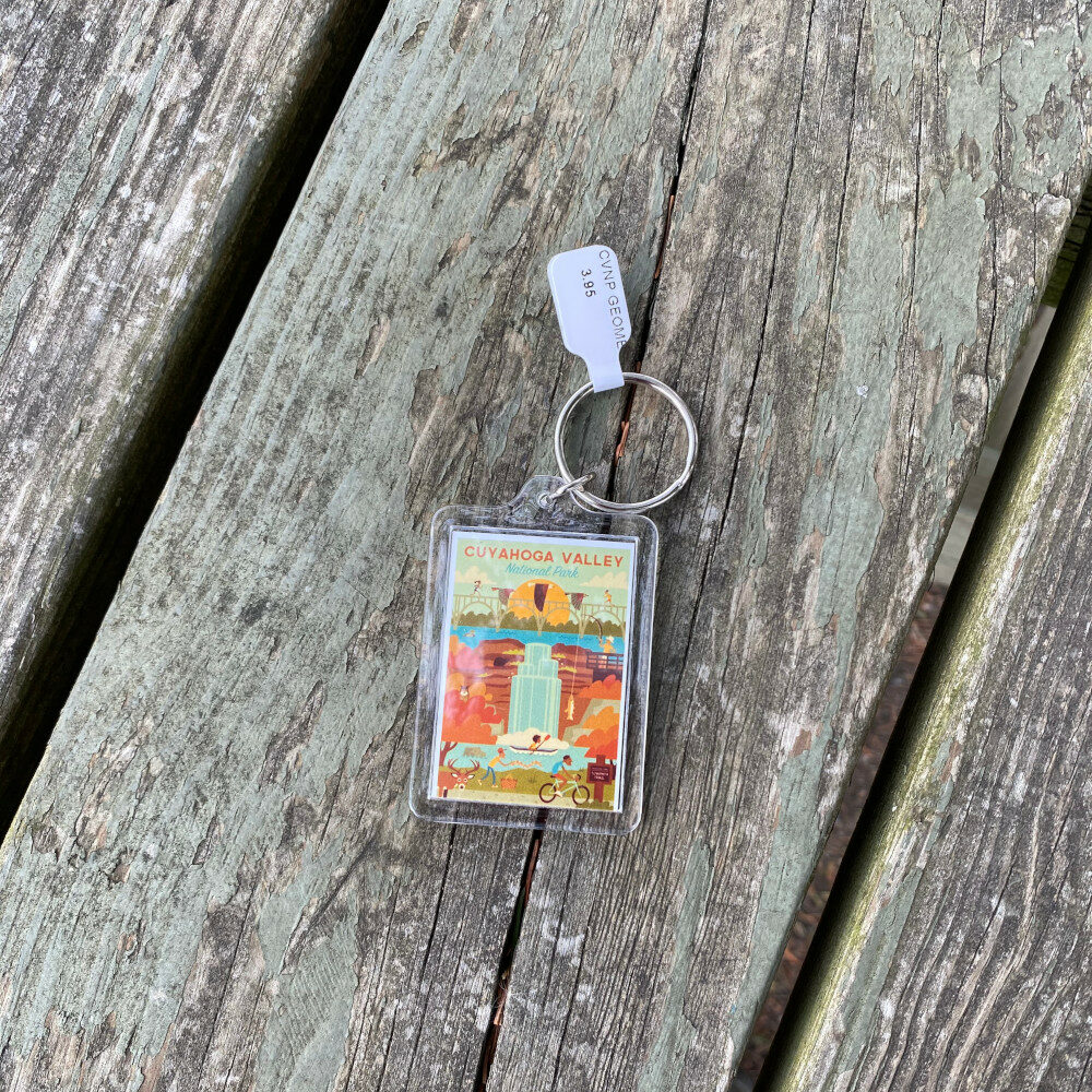 CVNP Geometric Keychain featuring a bridge, waterfall, and park activities