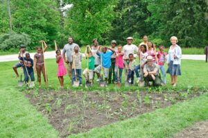 Students plant a pollinator garden in CVNP