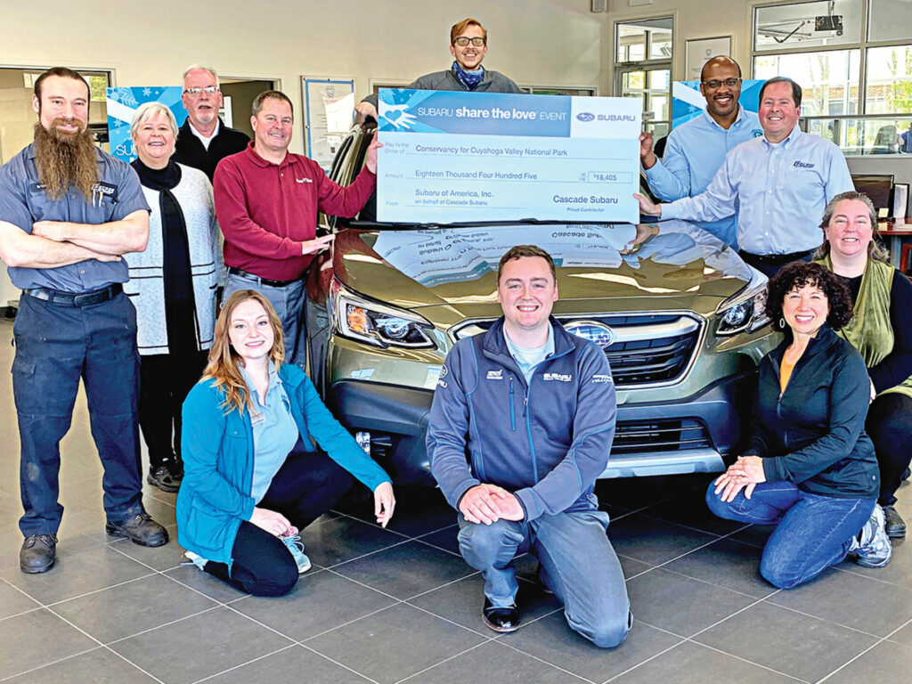 Cascade Subaru presents Conservancy with a check