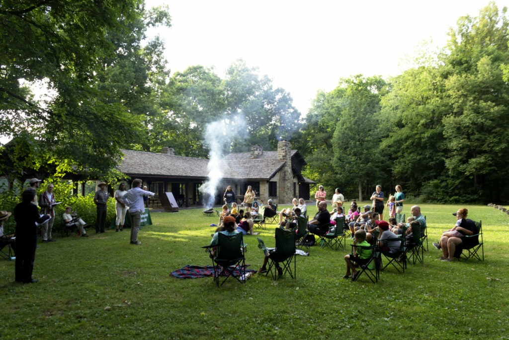 Families participating in campfire program at the Ledges Shelter