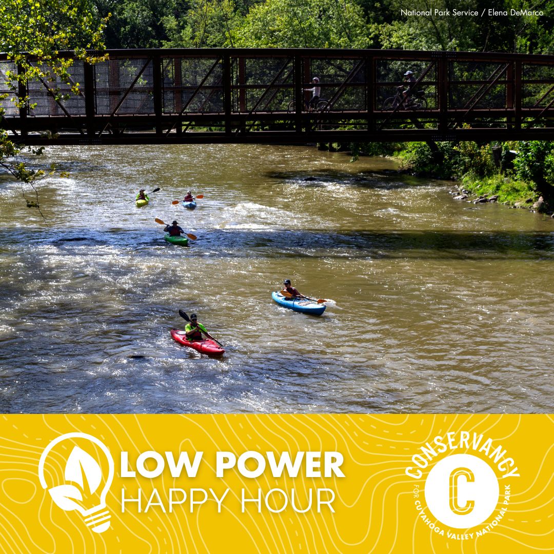 A graphic for a Low Power Happy Hour event in Cuyahoga Valley National Park. A photo of several people kayaking on the Cuyahoga River beneath a pedestrian bridge with two bikers traveling over it is included in the graphic along with a Low Power Happy Hour logo and a Conservancy for Cuyahoga Valley National Park logo.