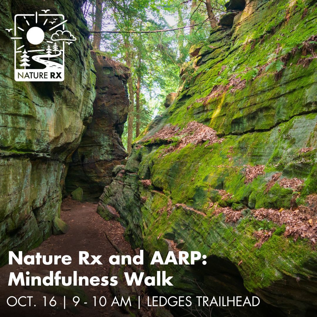 An image of large rock formations in Cuyahoga Valley National park serves as the background image for words that read: Nature Rx and AARP, Mindfulness Walk, October 16, 9 to 10 am, Ledges Trailhead.