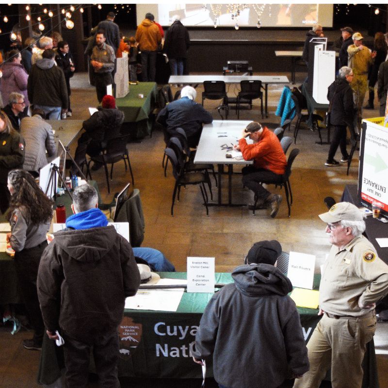 A photo of sveral people at an volunteer open house at Happy Days Lodge in Cuyahoga Valley National Park.