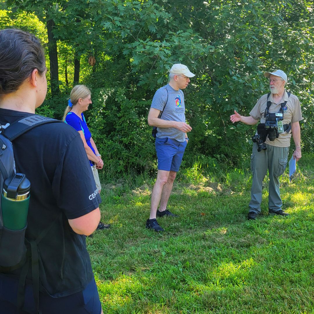 A photo of photographer Rick Santich leading a group on a photo hike.
