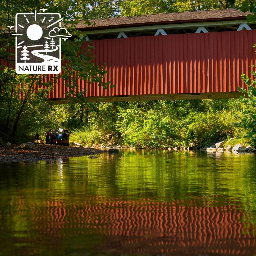 A photo of the red Everett Covered Bridge in Cuyahoga Valley National Park.