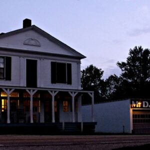 A picture of the Boston Store and MD Garage in the Boston area of Cuyahoga Valley National Park at dusk.